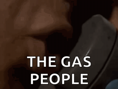 Person Talking On Phone Saying The Gas People GIF