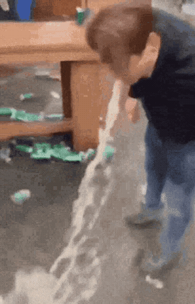 Person Throwing Up On Floor GIF