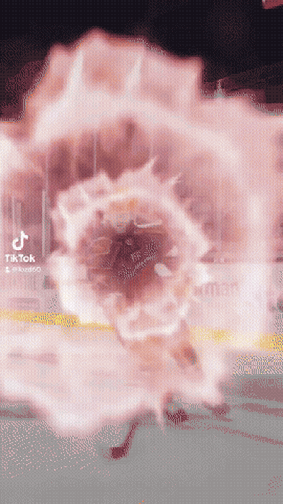 Person Thrown Into Pink Explosion GIF