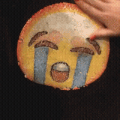 Person Touching Crying Smiley Face GIF