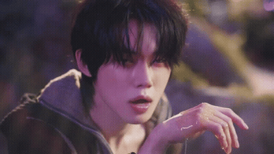 Person Touching Face On Purple Background GIF
