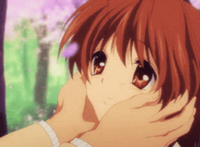 Person Touching Girl's Face GIF