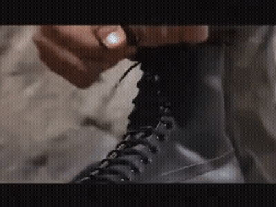 Person Tying a Boot