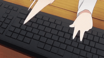 Person Typing On Black Keyboard GIF