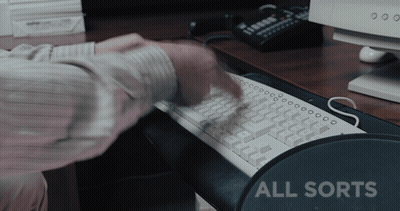 Person Typing On Keyboard With All Sorts GIF