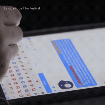 Person Typing On Tablet La Guarimba Film Festival GIF