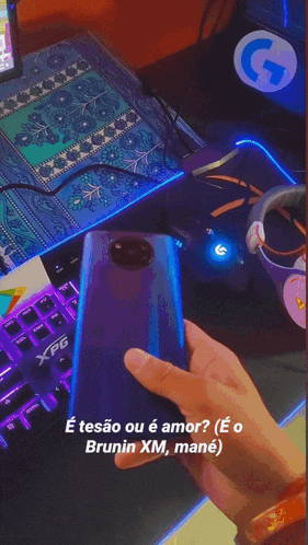 Person Typing On XPG Keyboard Next To Computer Monitor GIF