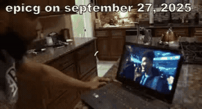 Person Using Laptop With September 27 2025 On Screen GIF