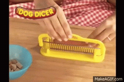 Person Using Yellow Dog Dicer To Cut Hot Dog GIF