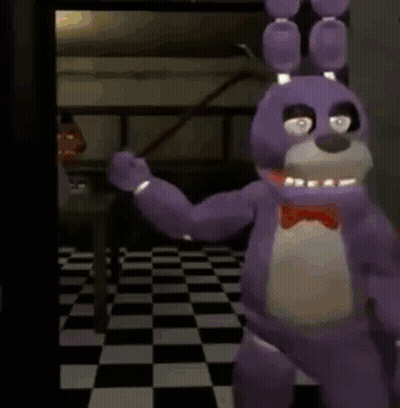 Person Walking Down Checkered Hallway GIF