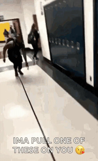 Person Walking Down Hallway Saying Ima Pull One Of These On You GIF