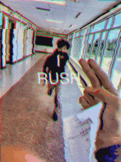 Person Walking Down Hallway With Rush On Wall GIF
