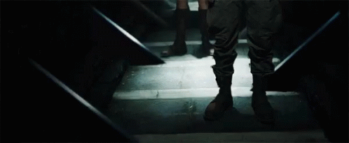 Person Walking Down Stairs GIF
