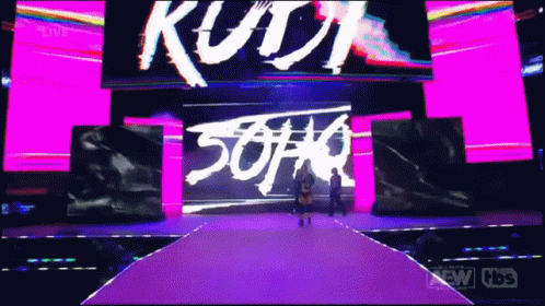 Person Walking On Stage With Kush Screen GIF