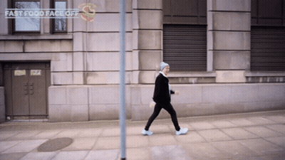 Person Walking Past Fast Food Face Off GIF