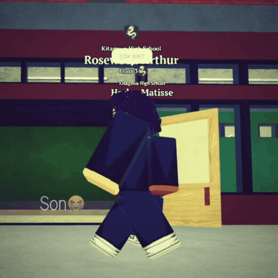 Person Walking Past Kitagawa High School Sign GIF