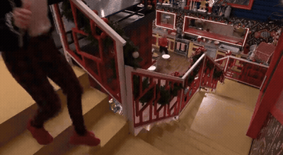 Person Walking Up Stairs In Kitchen GIF
