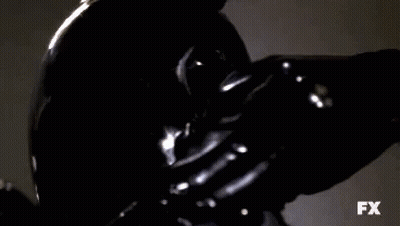 Person Wearing Black Mask And Gloves GIF