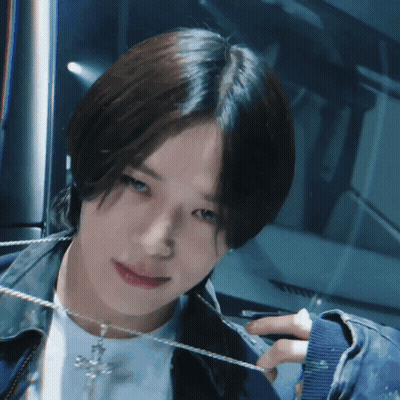Person Wearing Cross Necklace GIF