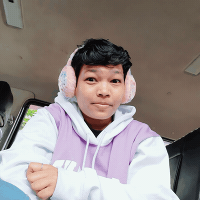 Person Wearing Ear Muffs And Purple Hoodie GIF