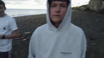 Person Wearing Essentials Hoodie GIF