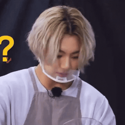 Person Wearing Face Mask And Apron With Question Mark GIF