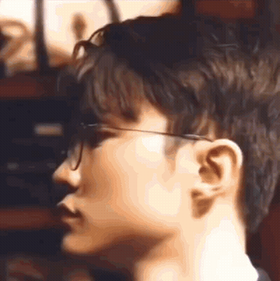 Person Wearing Glasses And Black Shirt GIF