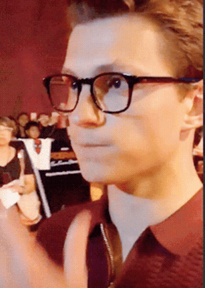 Person Wearing Glasses And Maroon Shirt GIF