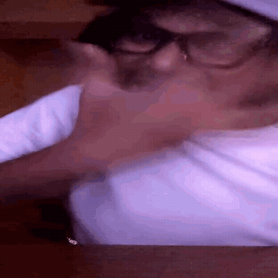 Person Wearing Glasses And White Shirt GIF