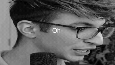Person Wearing Glasses Saying Oh GIF