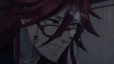Person Wearing Glasses With Glowing Lenses And Skull Earring GIF