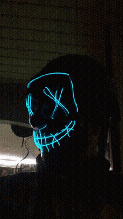 Person Wearing Glowing Blue Mask GIF