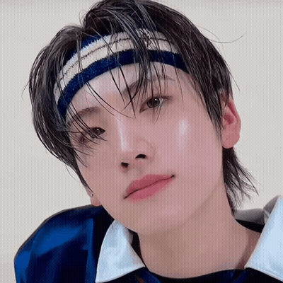 Person Wearing Headband And Blue Shirt GIF