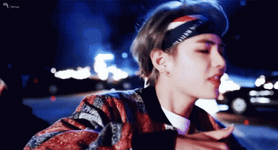 Person Wearing Headband And Jacket GIF
