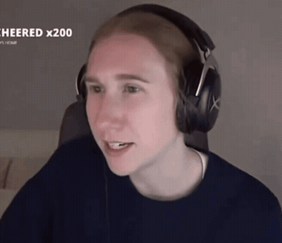 Person Wearing Headphones And Beanie Smiling GIF
