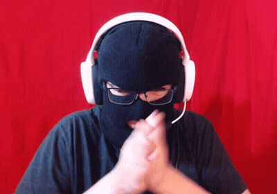 Person Wearing Headphones And Ski Mask GIF
