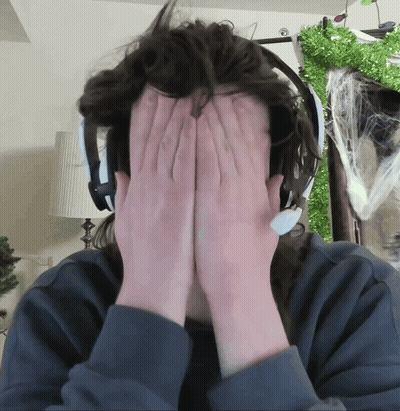 Person Wearing Headphones Covering Face
