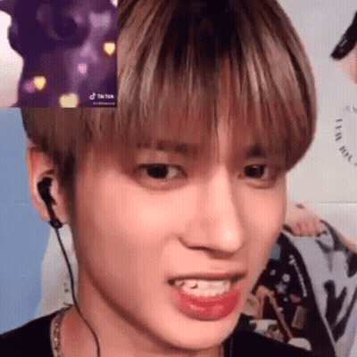 Person Wearing Headphones Making Face GIF