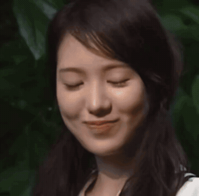 Person Wearing Headphones Smiling GIF