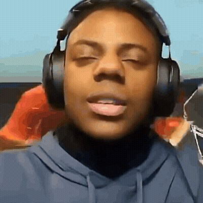 Person Wearing Headphones With Eyes Closed