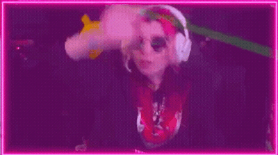 Person Wearing Headphones With Pikachu In Background GIF