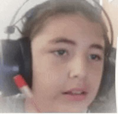 Person Wearing Headphones With Red Marker GIF