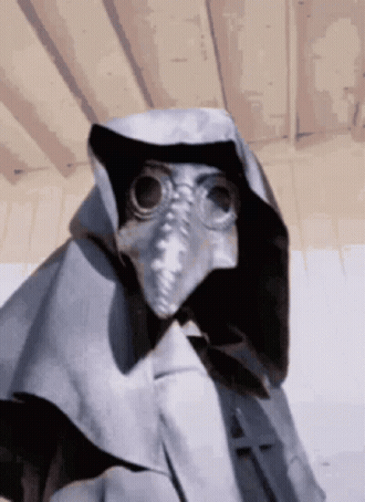 Person Wearing Mask Goggles And Cape GIF