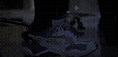 Person Wearing Pirma Blue And White Sneakers GIF