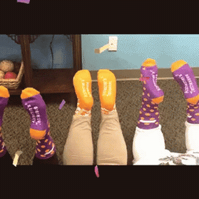 Person Wearing Purple And Orange Socks Saying I Love You GIF