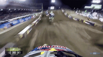 Person Wearing Red Bull Helmet During Race GIF