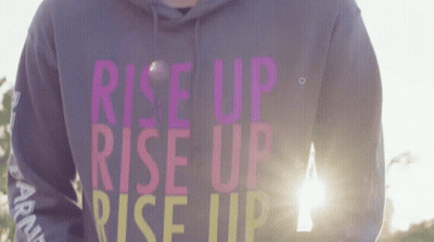Person Wearing Rise Up Rise Up Hoodie GIF