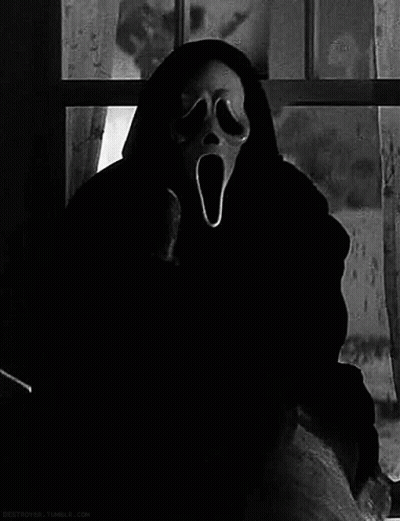 Person Wearing Scream Mask At Window GIF