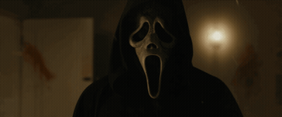 Person Wearing Screaming Mask GIF