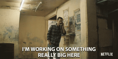 Person Wearing Sombrero Holding Black Bag GIF